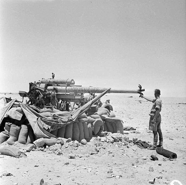 New Zealand Soldier with a captured German 88mm anti-tank gun near El Alamein