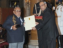 The President, Shri Pranab Mukherjee presenting the Dhyan Chand Award for the year-2014 to Shri Khatau P. Thakkar for Swimming, in a glittering ceremony, at Rashtrapati Bhavan, in New Delhi on August 29, 2014.jpg