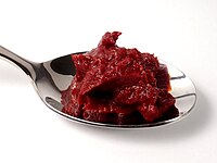 Tomato paste Tomato paste on spoon.jpg