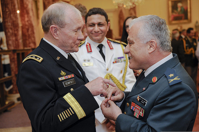 File:U.S. Army Gen. Martin E. Dempsey, left, the chairman of the Joint Chiefs of Staff, speaks with a guest during a reception for foreign defense attaches at the Department of State headquarters in Washington 130611-D-HU462-326.jpg