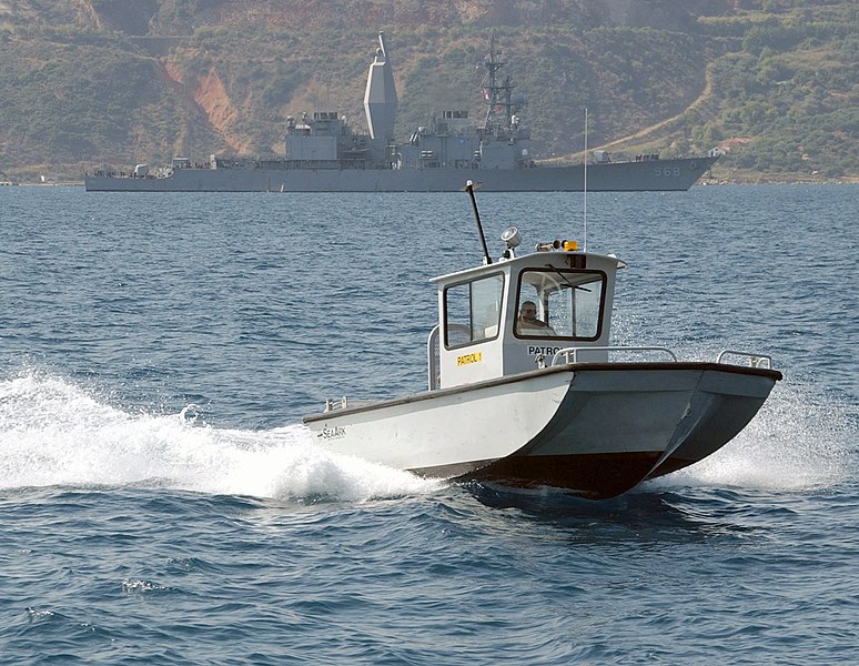 File:US Navy 020830-N-0780F-006 A Naval Support Activity patrol boat keeps watch over harbor activities in Souda Bay, Crete, Greece.jpg