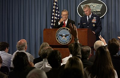 Secretary Rumsfeld responds to a reporter's question during a Pentagon press briefing. Rumsfeld and General Richard Myers, Chairman of the Joint Chiefs of Staff, gave reporters an operational update on Operation Iraqi Freedom on October 2, 2003.
