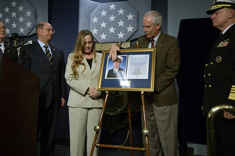 File:US Navy 071023-N-5319A-208 Daniel and Maureen Murphy, the parents of Navy SEAL Lt. Michael Murphy admire a photo of their son during a ceremony held at the Hall of Heroes inside the Pentagon.jpg