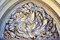 Ex Nihilo (Out of Nothing) by Frederick Hart, tympanum over center doors, Washington National Cathedral.