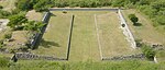 One of the ballcourts at Xochicalco. Note the characteristic -shape, as well as the rings set above the apron at center court. The setting sun of the equinox shines through the ring.