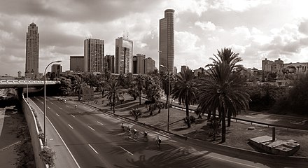 Cyclists ride down a deserted motorway in Tel Aviv on Yom Kippur