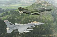 52nd TFW Wild Weasel-team in the late 1980s fly by Hohenzollern Castle. 52TFW F-4G F16C.jpg