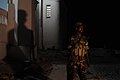 A member of the Somali National Army stands on the streets of Mogadishu during a joint night operation between the Somali security services and AMISOM in order to search for suspected al Shabab (14110380441).jpg