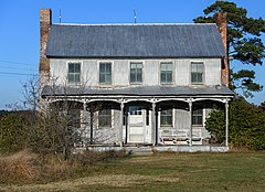 An abandoned and decaying example of Southern American Rural Vernacular architecture commonly seen in the 1800s and 1900s, surviving well into the 21st Century