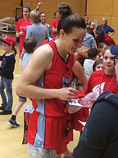 Schwagmeyer signing autographs in October 2017 following her WNBL debut for the Perth Lynx Alison Schwagmeyer Lynx.jpg