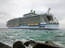 Port Everglades hosts the two largest cruise ships in the world as of 2014, Oasis of the Seas and Allure of the Seas, pictured leaving the port. Allure of the Seas leaving Port Everglades.jpg