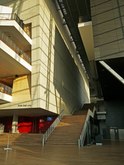 Amsterdam photo 2018 of modern architecture, free download; interior of the concert hall Muziekgebouw aan 't IJ - ground floor with high staircases and access to the great hall (left). Fons Heijnsbroek, free image in high resolution