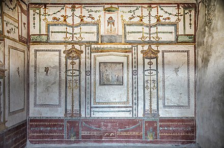 North wall of the oecus richly decorated in the Fourth Style An oecus richly decorated in the Fourth Style in the House of the Prince of Naples, Pompeii, Italy 2nd century BCE - 1st century CE.jpg