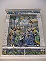Adoración de los magos, retablu en terracota d'Andrea della Robbia (1500-1510).