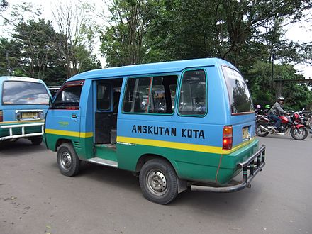 Angkot (public minivan) in Bandung. The angkot routes can be identified based on the colours of the van.