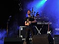 Le sonneur Anthony Masselin en concert avec le groupe de rock celtique Soldat Louis à Plounévez-Lochrist en 2012