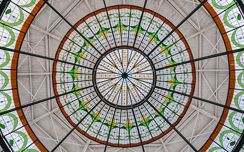 Glas dome of the old Victoria market, old city of Puebla de Zaragoza, Mexico. The market, built in 1914 in honor to Guadalupe Victoria was one of the last wrought iron constructions in Mexico.
