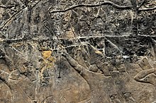 Assyria slingers hurling stones towards the enemy at the city of -alammu. Detail of a wall relief dating back to the reign of Sennacherib, 700-692 BCE. From Nineveh, Iraq, currently housed in the British Museum.jpg