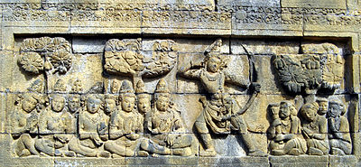 Low to mid-relief, 9th century, Borobudur. The temple has 1,460 panels of reliefs narrating Buddhist scriptures.