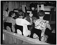 Three operators working shifts of three each on duty day and night for the phones Boy Scouts who are attending the worlds Jamboree in Washington wont have any trouble calling Mom 22947v.jpg