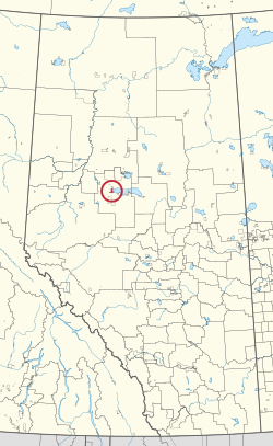 Eine Karte der Provinz Alberta mit 80 Landkreisen und 145 kleinen Indianerreservaten.Einer ist mit einem roten Kreis hervorgehoben.