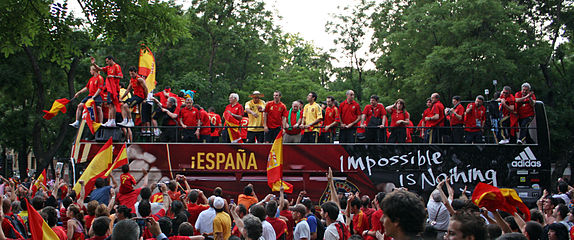 The Spanish football team touring Madrid as champions