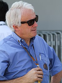 Man in his late fifties wearing sunglasses and a blue T-shirt