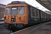 Class 303 unit 303 089 in unrefurbished condition with TransClyde markings at Wemyss Bay