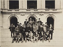 Decorative artists of the Minnesota State Capitol. Person 2nd from left, front row likely Elmer Garnsey. Decorators of the Minnesota State Capitol.jpg