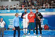 Deutsch: Fechten bei den Olympischen Jugend-Sommerspielen 2018: Tag 1, 7. Oktober 2018, Jungen, Säbel, Siegerehrung - Gold: Krisztián Rabb (HUN), Silber: Hyun Jun (KOR), Bronze: Mazen Elaraby (EGY); Medaillen überreicht durch IOC-Mitglied Britta Heidemann, Maskottchen überreicht durch FIE-Generalsekretär Emmanuel Katsiadakis English: Fencing at the 2018 Summer Youth Olympics at 7 October 2018 – Boys' sabre Medal ceremony – Gold: Krisztián Rabb (HUN), Silver: Hyun Jun (KOR), Bronze: Mazen Elaraby (EGY); Medal presenter: IOC member Britta Heidemann, Mascot presenter: FIE Secretary General Emmanuel Katsiadakis