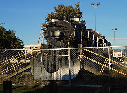 Engine 556, a 2-8-0 built by Baldwin Locomotive Works, was used by the Alaska Railroad in the 1940s and 1950s following initial service in Europe during World War II. The locomotive is shown on display at the southeast corner of Ninth Avenue and E Street, where it has sat since 1959. Former Alaska Railroad locomotive on display at Delaney Park Strip, Anchorage, Alaska.jpg