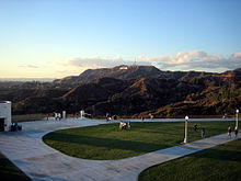 A clear evening view of Mount Lee and the Hollywood Sign from the Griffith Observatory lawn Griffith Observatory entrance lawn with Hollywood sign.jpg