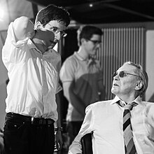 Helmut Berger (right) and Alexander Tuschinski on the set of Timeless (2015) Helmut Berger Alexander Tuschinski Set Timeless.jpg