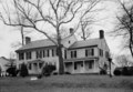 The parsonage house and academy building in 1937