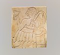 Inlay- seated male with cup and palm frond MET DP122510.jpg
