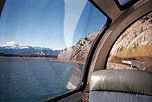 Jasper Lake with mountains in the distance as seen from the Canadian passenger train.