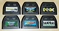 Codemasters J-Carts were special cartridges with integrated multitaps.[45] Pictured are all 6 released J-Carts.