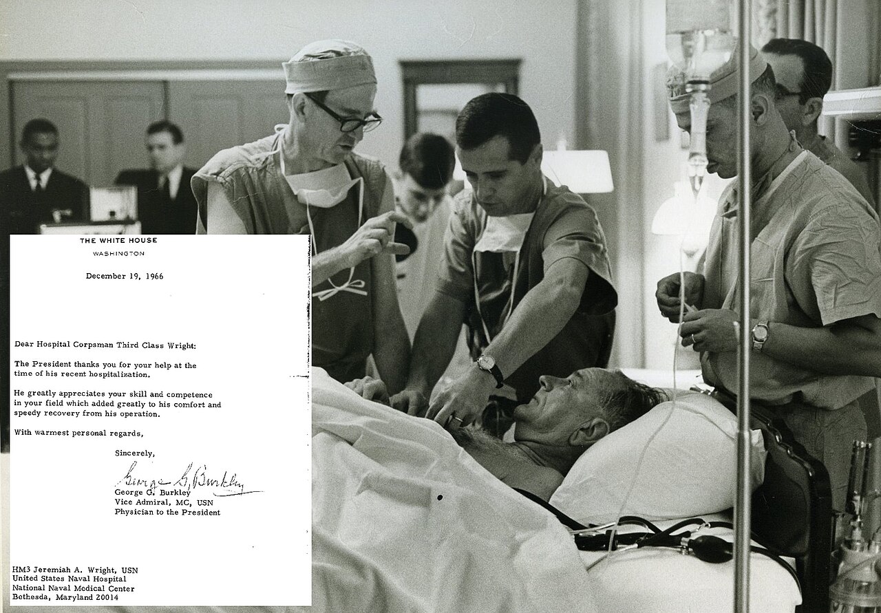 1280px-Jeremiah_Wright_as_a_Marine_Medic_Tending_to_Pres_Lyndon_Johnson.jpg