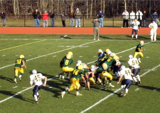 The option offense can be run out of various formations. Here, Morris Knolls High School of Denville, New Jersey is running the veer option.