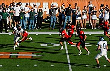 A football game of the Lake Travis Cavaliers vs the Cedar Park Timberwolves Lake Travis High School football team vs Timberwolves.jpg