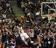 Billups taking a shot in a game against the Memphis Grizzlies, 2006 Lorenzen Wright Chauncey Billups cropped.jpg