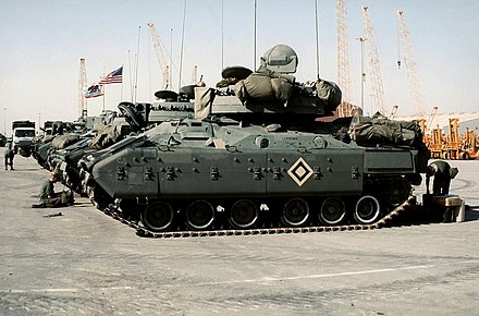M3 Bradleys of L Troop, 3rd ACR, stand in line at a holding area during the build-up to Operation Desert Shield.