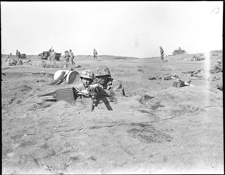 File:Machinegunner takes aim, February 1945.jpg