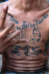 MS gang sign and tattoos Mara Salvatrucha MS13.jpg
