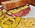 Mmm... Corned beef and Swiss on deli rye with Dijon and dill pickles (6256959853).jpg