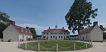 Built in classic Palladian architecture style, the home's west side is flanked by advancing single-story secondary wings creating a cour d'honneur. Mount Vernon, Virginia crop 2.jpg