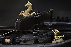 Detail of a Venetian funerary gondola with a golden seahorse