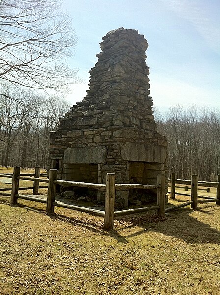 A stone chimney with four fireplaces is all that is left of General Nathaniel Lyon's birthplace homestead at Nathaniel Lyon Memorial State Park.