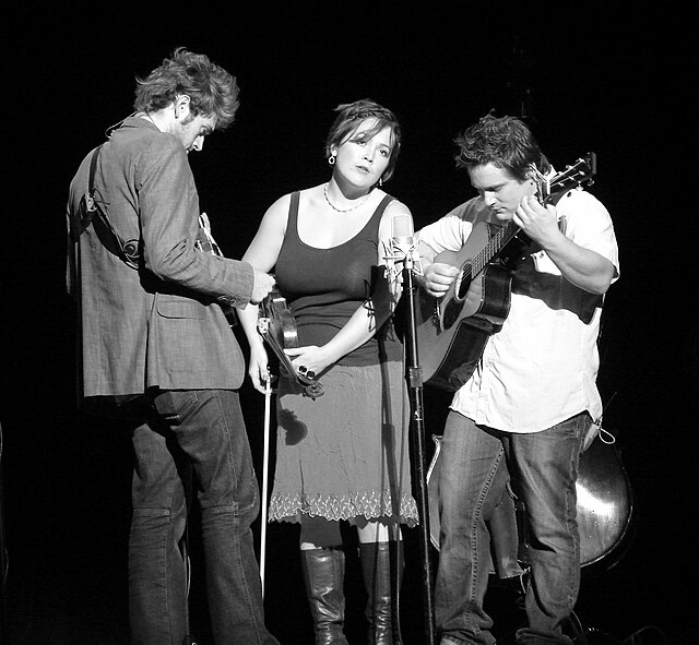 Chris Thile, Sara Watkins, and Sean Watkins on the Farewell (For Now) Tour in October 2007.