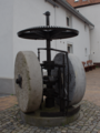 English: Industrial heritage (edge runner millstones) in Nidda, Unter-Schmitten Schulweg, Hesse, Germany